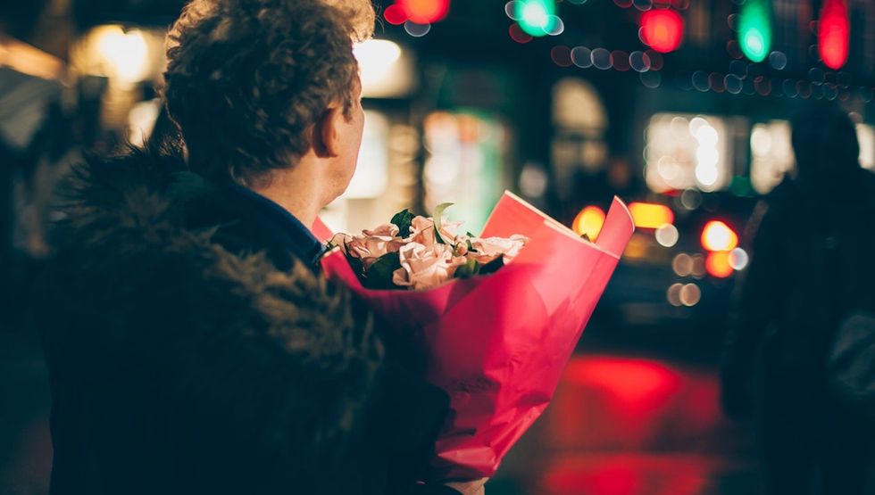 Guide: 10 Romantic Valentine’s Day Dinner Spots valentine's day guy with roses