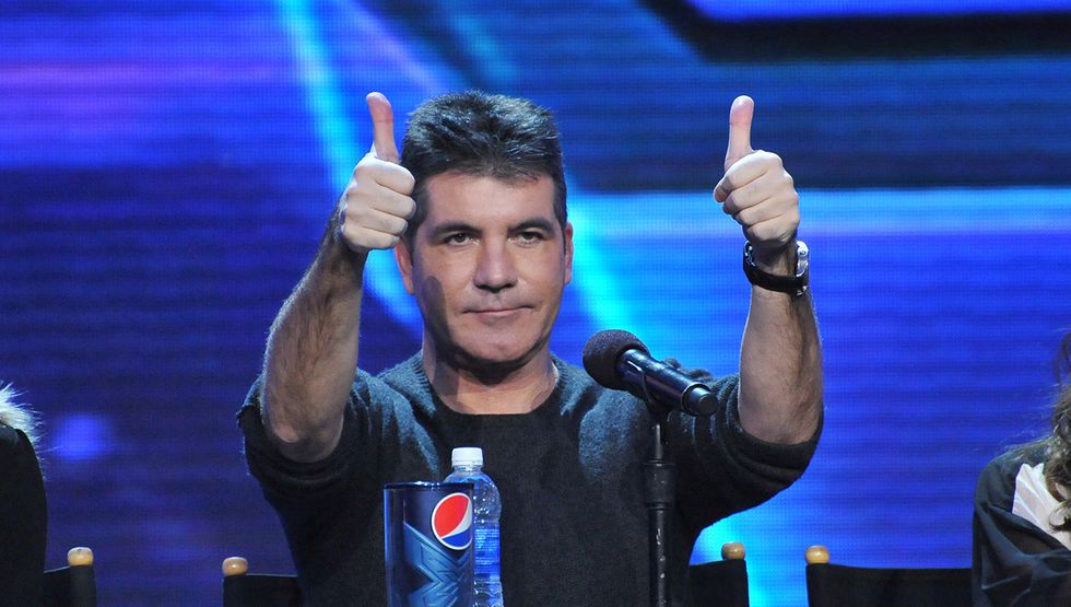 Simon,Cowell,At,The,Press,Conference,For,The,Season,Finale good news stories canada