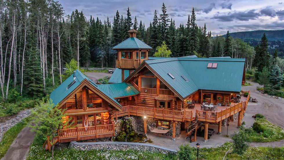 This remote BC estate for sale would make even Santa blush river house estate