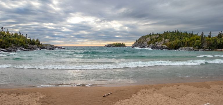 There’s a secluded beach in Ontario with golden sand & emerald lake-water