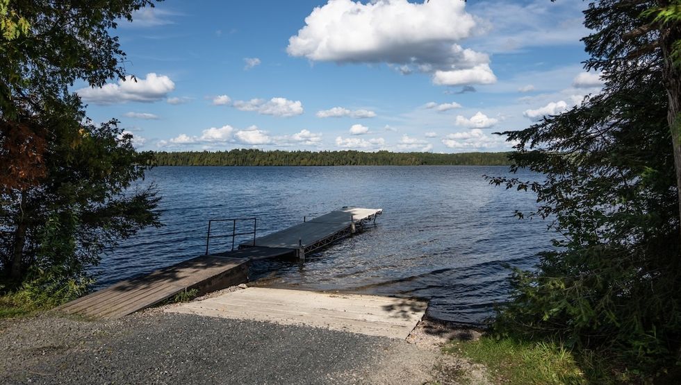 This Ontario park has two sandy beaches on a clear & shallow lake