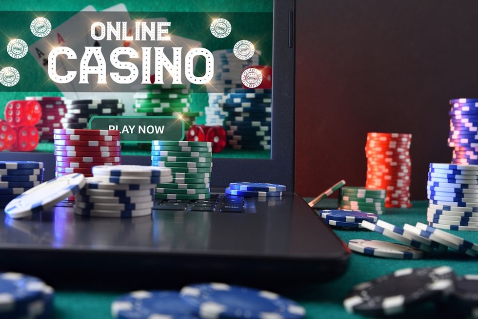 Concept,Of,Playing,Online,Casino,Games,With,Laptop,With,Gaming Jackpot City