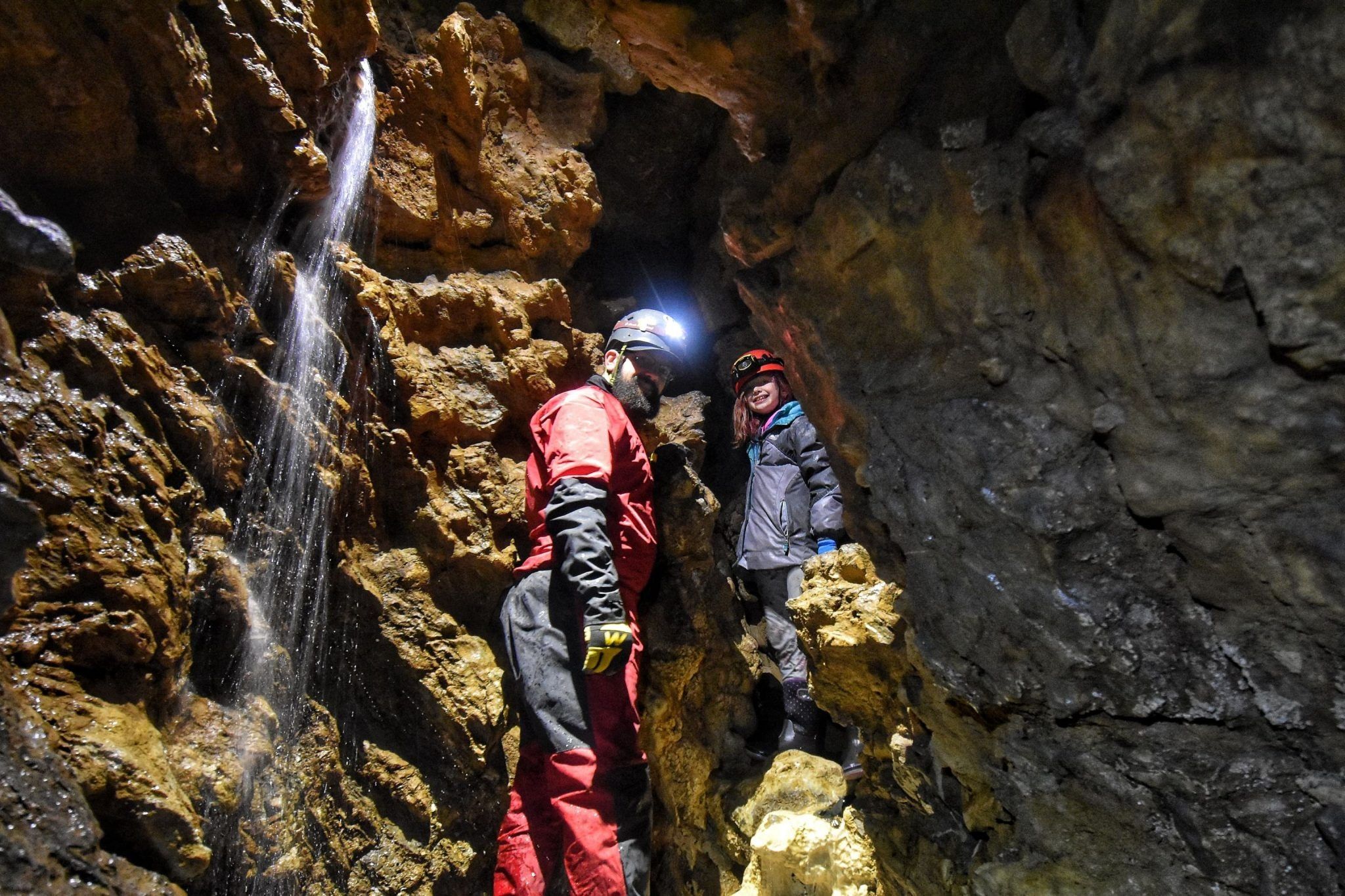 An underground waterfall flows through these ancient caves in B.C.