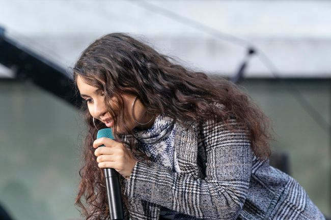 Alessia Cara performing on stage