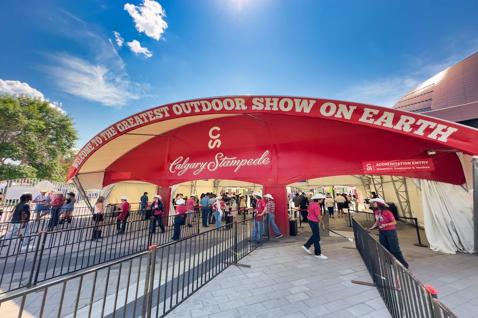 Calgary, Alberta – July 10, 2024: Tourists and locals at Calgary Stampede. Tourists and locals at Calgary Stampede.
