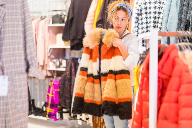 woman shopping for vintage clothing.