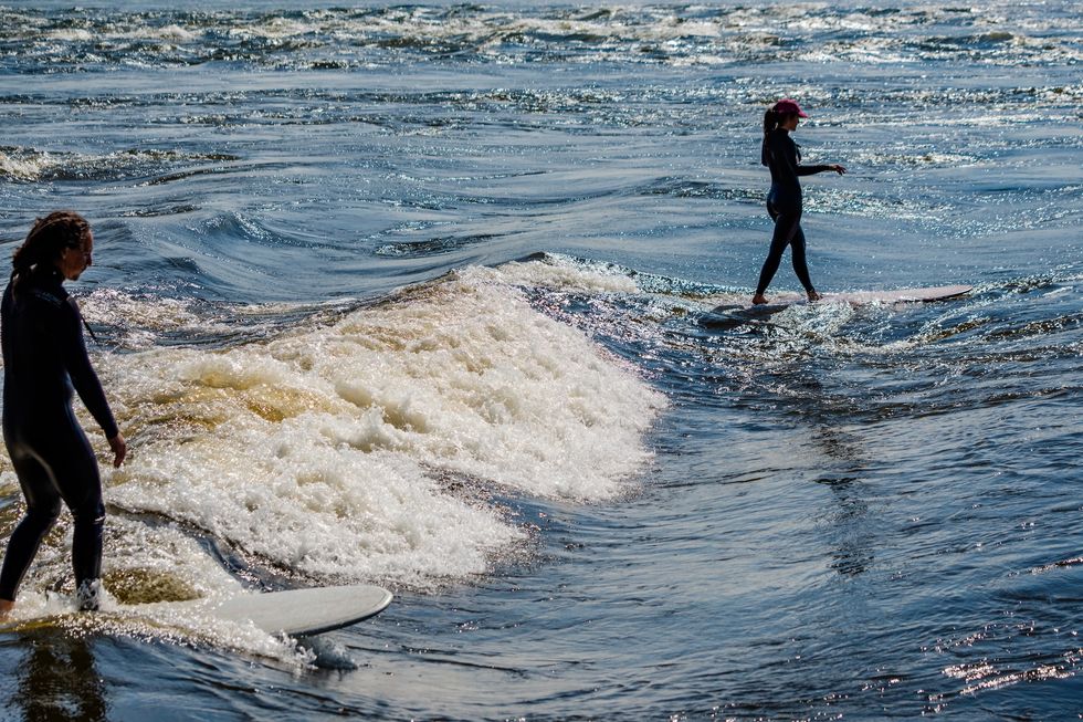 Surfing Surfing in the River