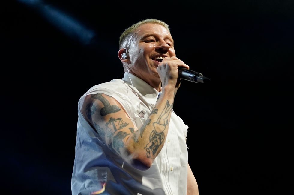 Macklemore performing on stage