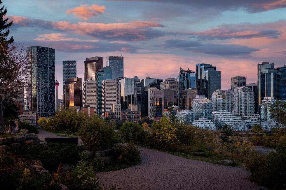 A view of Calgary city with its skyscrapers and beautiful sunset in the background, Alberta, Canada