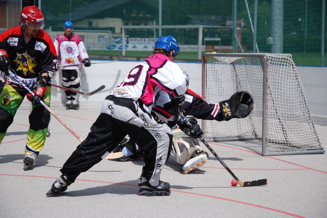 Players competing in street hockey tournament
