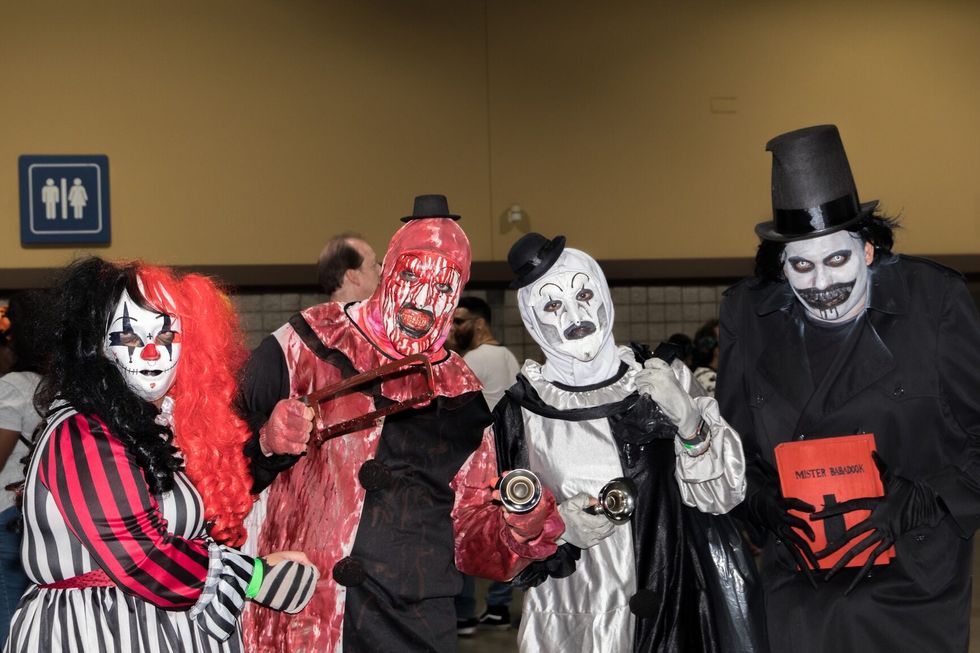 People in character cosplay costumes and vendors.