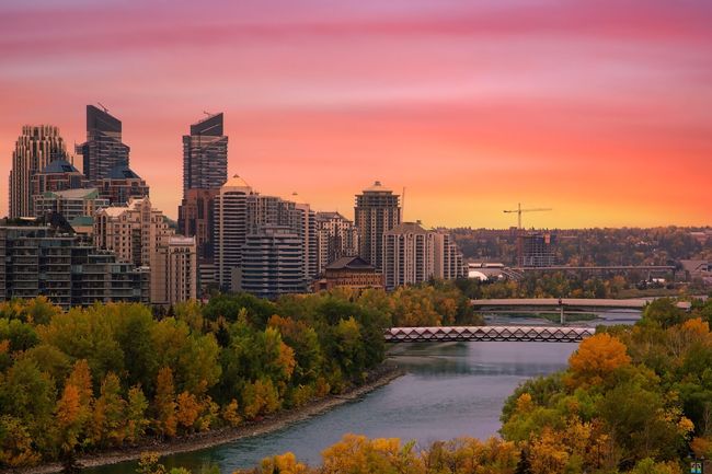 Fall sunrise glowing over the downtown Calgary river valley