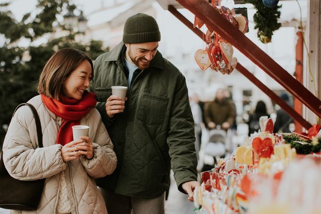 Couple shopping at Christmas market