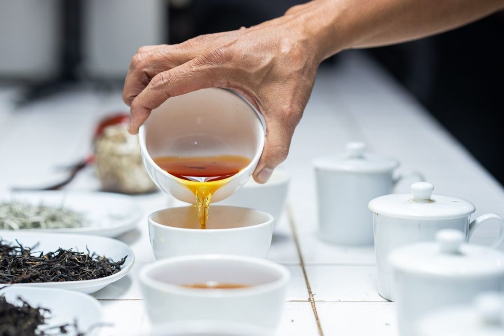 Cupping or testing the quality of the tea